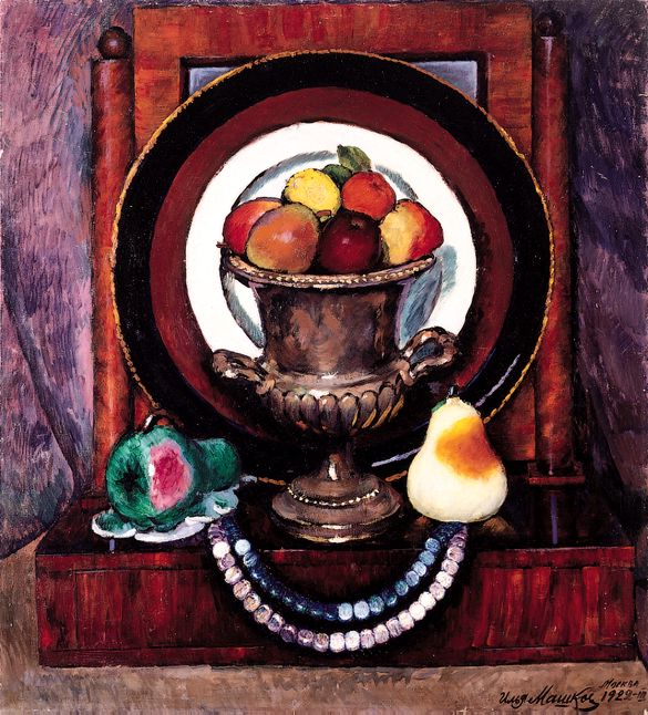 Mashkov: <b>Ilya Ivanovich Mashkov (1881-1944)</b>    Still Life a Mirror, a Plate, and Fruit in a Classical Steel Urn  signed and dated Moscow 1922, oil on canvas    <i>99 by 90cm.	</i>    <i>Provenance:</i>  Purchased in Berlin or St. Petersburg in the 1920s by A. Konstantinovski, a Russian citizen resident in Berlin, and the grandfather of the present owner.  Thence by descent to his son and grandson, Paris.    Our painting is fully signed by the author and dated Moscow, 1922, the same date as other published works by Mashkov which contain several elements also present in our still life; the steel urn, the mahogany mirror and the porcelain fruits. See I.S. Bolotina, op.cit., plate 59 Still Life with a Doll , plate 62 Still life with a fan, (in the Russian Museum) and plate 63 Still life with porcelain fruits. Our canvas is remarkable in that it has been in the same collection for more than half a century, and has never been exhibited (see the attached letters from the former owner).    Together with Mikhail Larionov, Piotr Konchalovsky and Aristarh Lentulov, Mashkov founded the group known as Bubnovy Valet (Knave of Diamonds), whose first exhibition was held in 1910. Mashkov undoubtedly comes across as the most original of these artists. Having assumed the analytical method of Cezanne, and combined it with the representational language of an urban primitive (using, for example, street signs as an inspiration), he created his own synthesis of the two trends, giving a monumental character to his easel painting.    Mashkovs synthesised style is on the verge of the confrontational and is distinguished by the deliberate flatness of the composition, the powerful rendition of modelling using colour and the tension of the unusual colours themselves . All these qualities may be discerned in the above still life, which distinguish it as a first class example of the masters fully developed style  